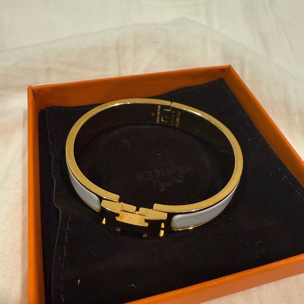 Gold and White Hermes clic H bracelet cuff